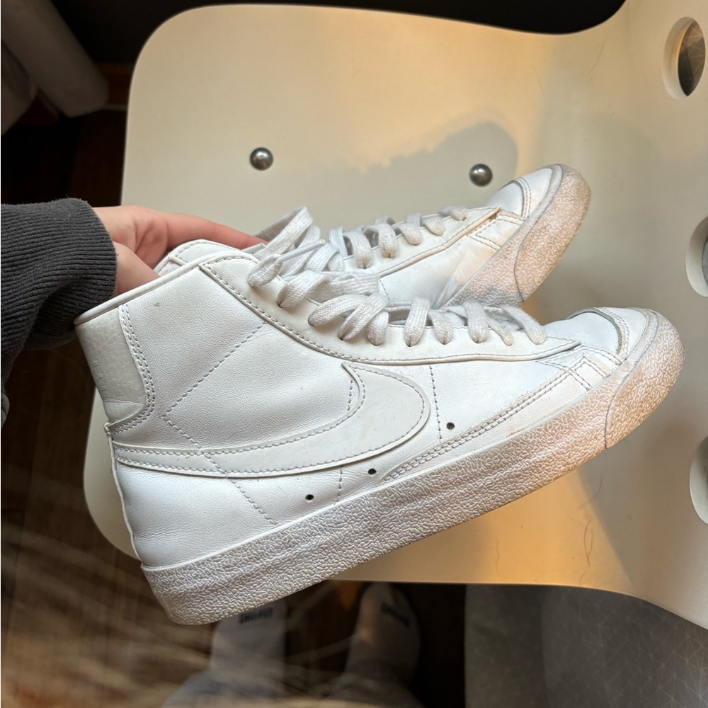 All white Nike blazers
